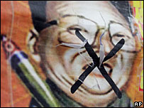 Cartaz contra o líder norte-coreano Kim Jong-il