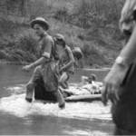 Towing Than Shwe on a lilo down the river Chaunggyi. May 8th 1942 Towing Than Shwe on a lilo down the river Chaunggyi. May 8th 1942