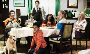 L-R Aidan McCardle as Andy, Luke Ward-Wilkinson as Simon, Samuel Barnett as Simon, Layton Williams as Kylie, Meera Syal as Auntie Hayley, Sophie Ash as Ashlene and Olivia Colman as Debbie