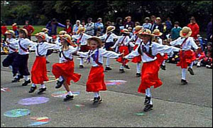 Girls dance in playground.