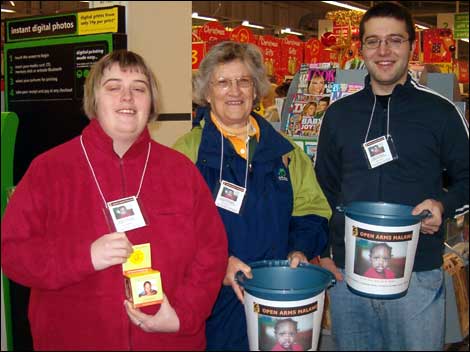Henry (r) rasing money in a supermarket