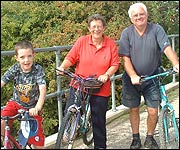 Cyclists on the bridge over Morton's Leam