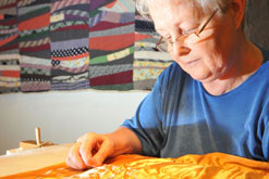 Lilian Hedley, North Country Quilter, working on a piece at the launch of the Quilt Museum and Gallery, York.