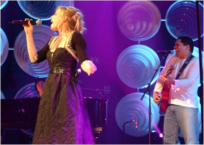 Natasha Bedingfield on stage at the R1 / TOTP Christmas Party