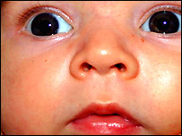 A close up of a baby's face