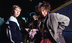 George MacKay and Zoe Wanamaker as Johnny and Mrs Tachyon