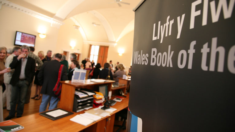 A blurred image of the longlist announcement held at Bangor Business School.