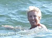 One of the hardy Sandy Bottom all-year-round swimmers