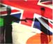 Montage showing Derry's statue of reconciliation, 'hands across the divide', against a backdrop of the British and Irish flags