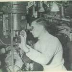THis is a picture of King George VI on board HMS during WW2.  CPO William George Barnett is in the background.