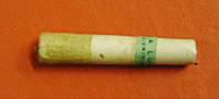 Greased rifle cartridge