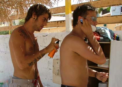 JK & Joel take up the challenges set by Vernon's listeners - JK had to get a rub down from a man on the beach whilst Joe had to twang as many bikinis as possible in 60 seconds

