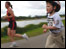 Woman and child running