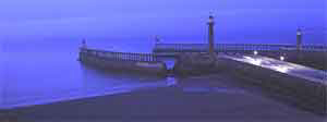 Whitby pier at night by John Greenwood