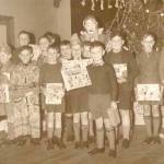 Christmas Party, Berkshire 1939. The presents were "on loan" for the picture which was taken for the East Ham Echo newspaper. Donald is fourth from the right and Henry second from left in the front row. Christmas Party, Berkshire 1939. The presents were "on loan" for the picture which was taken for the East Ham Echo newspaper. Donald is fourth from the right and Henry second from left in the front row.