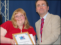 BBC East Midlands Today's Dominic Heale presents the Carer Award to Fiona-Rose Mills