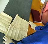 Image of Peter Shakeshaft studying a document