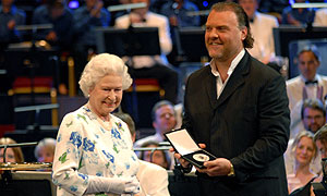 HM The Queen presents the medal to Bryn Terfel (image: Chris Christodoulou, BBC)