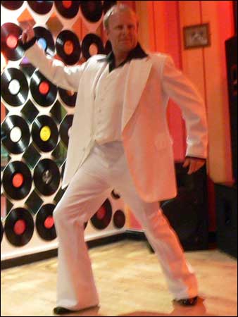 Howard Bentham as John Travolta