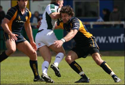 Warriors tackle London Irish player.