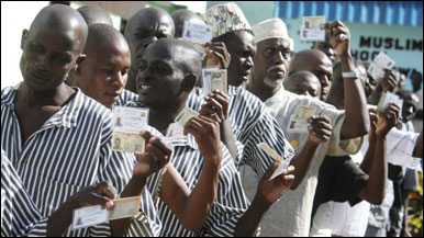 Inmates at the Shimo la Tewa GK Prison line up to cast their votes for the new constitution in Mombasa, Kenya , Wednesday, Aug. 4 2010