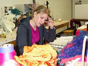 Billie at her design table