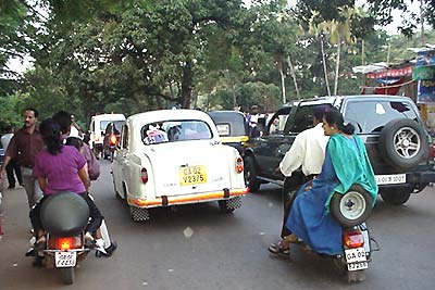 Scooters and saris.