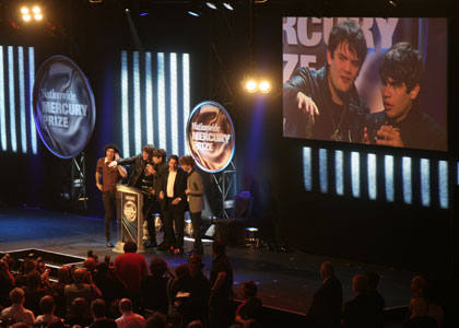Klaxons receive their prize