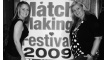 Jackie and Mo with the Matchmaking Festival poster.