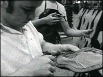 Worker glueing soles